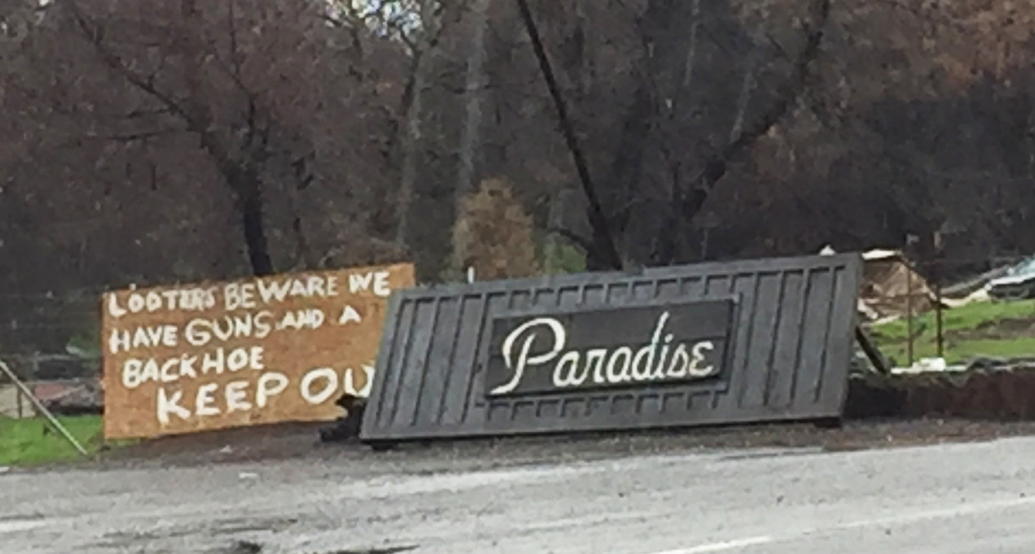 The welcome sign to Paradise now includes a warning to looters.